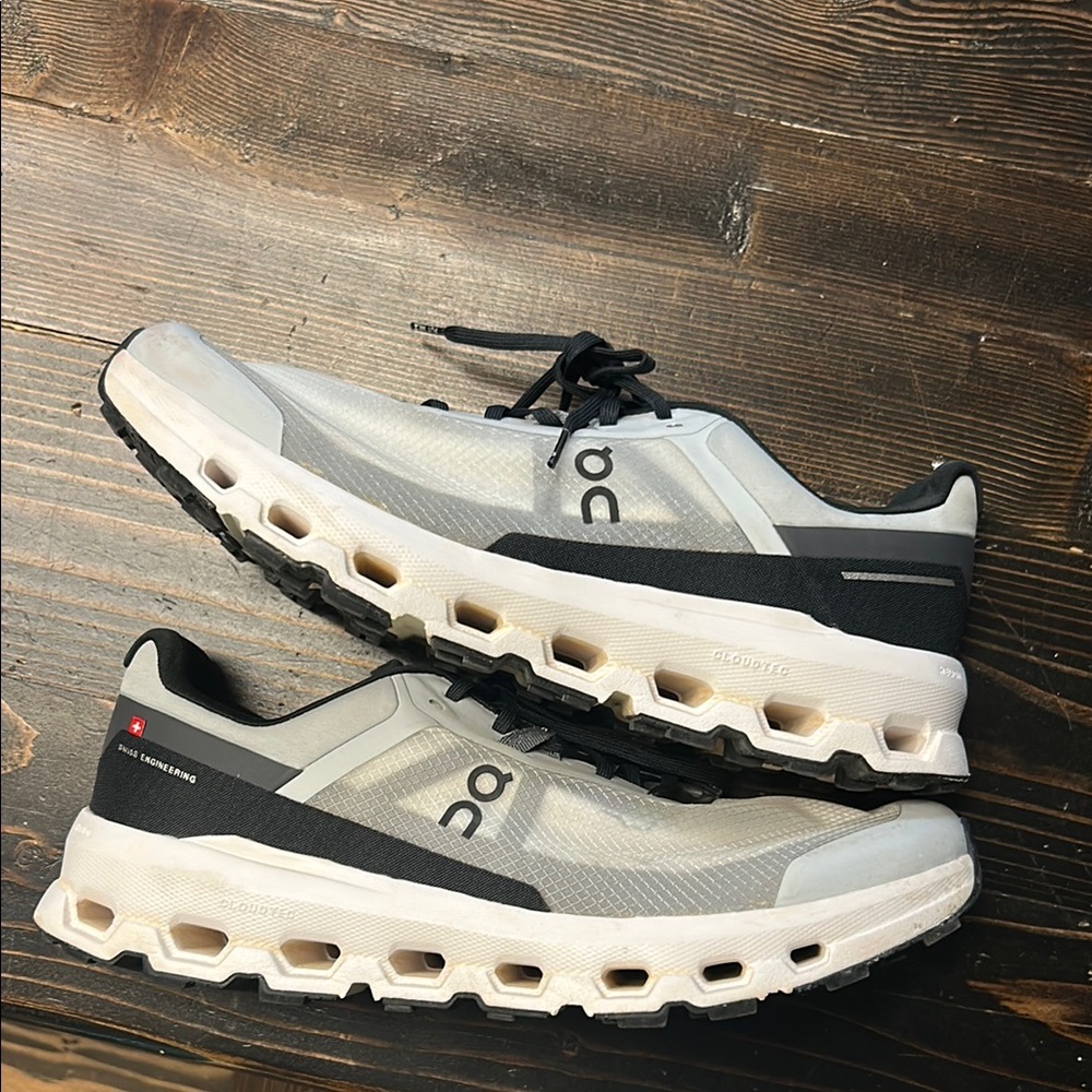 On Running Black and White Athletic Shoes with CloudTec Sole